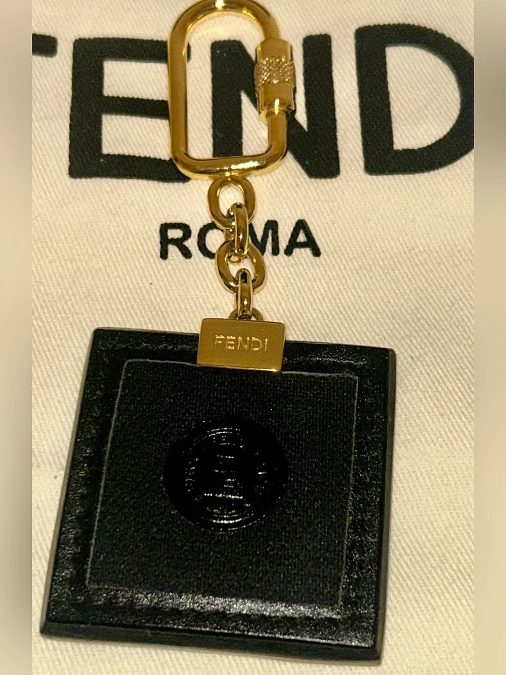 Fendi square leather keychain or Bag Charm.  Full Inclusion.  Vintage and Rare